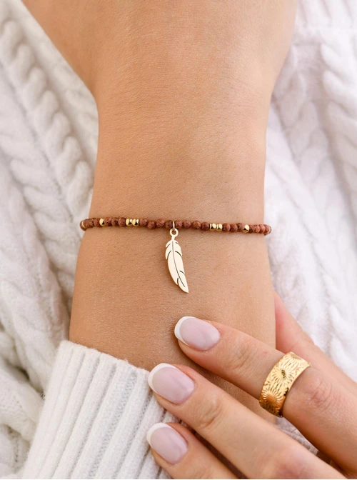 Bransoletka piórko, Piasek Pustyni, stal pozłacana S108586Z00