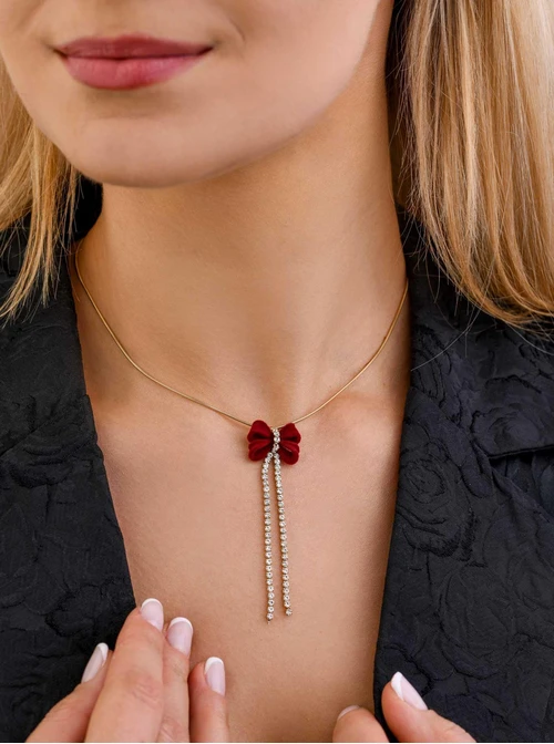 Naszyjnik kokardka, kryształki, stal pozłacana S308185Z03