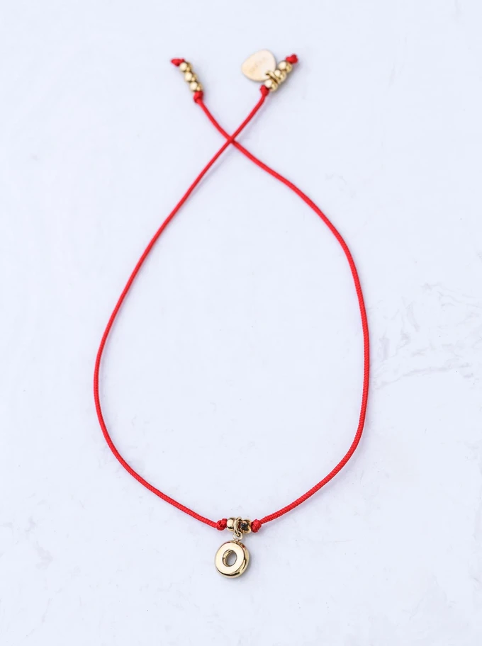 Bransoletka szczęścia, literka O, stal pozłacana S109077Z03