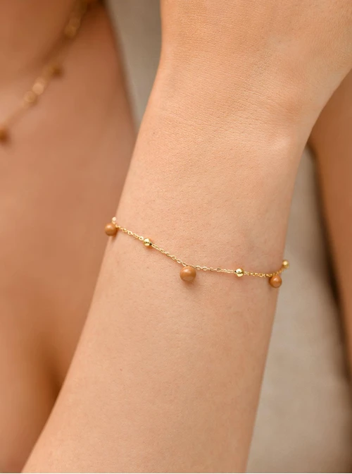 Bransoletka beżowe kuleczki, stal pozłacana S109452Z13