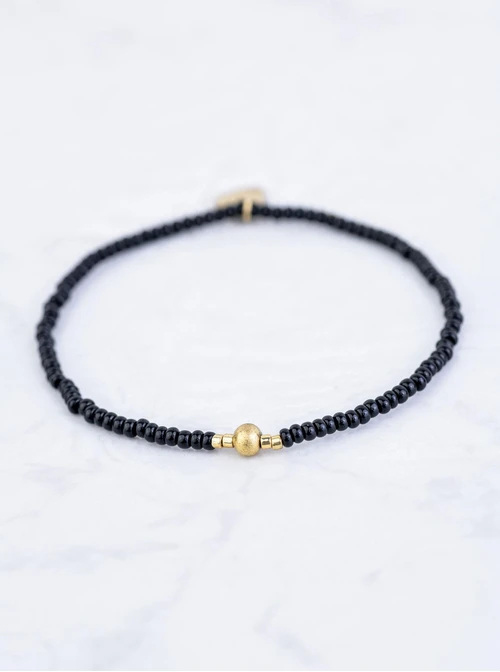 Bransoletka czarne koraliki, kulka, stal pozłacana S109371Z01