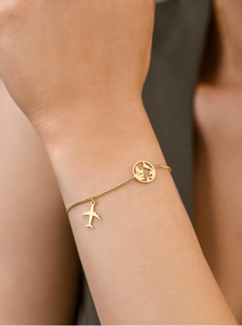 Bransoletka mapa świata, samolot, stal pozłacana S109511Z00