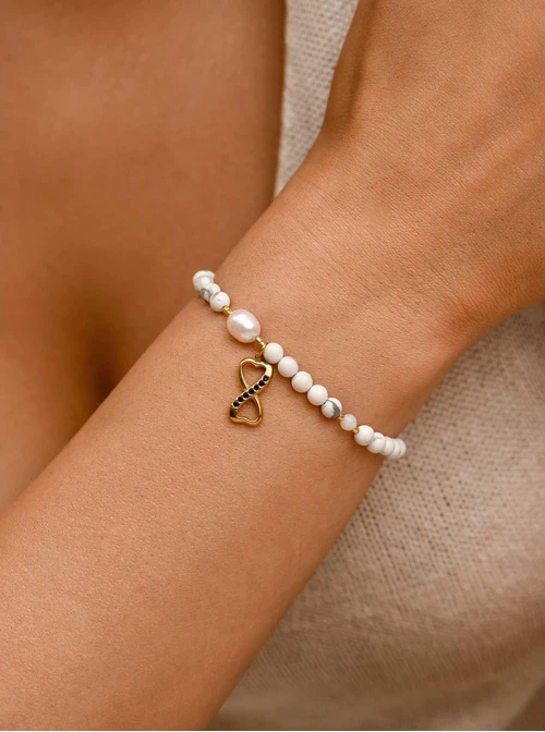 Bransoletka nieskończoność, Howlit, stal pozłacana S109396Z01