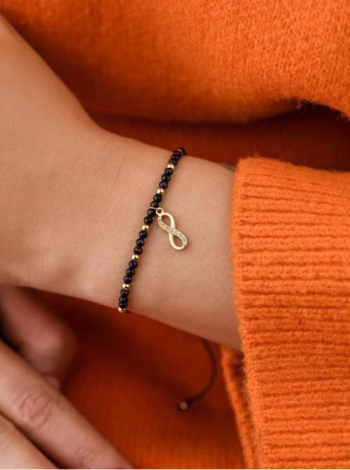 Bransoletka nieskończoność, Onyks, stal pozłacana S108521Z00