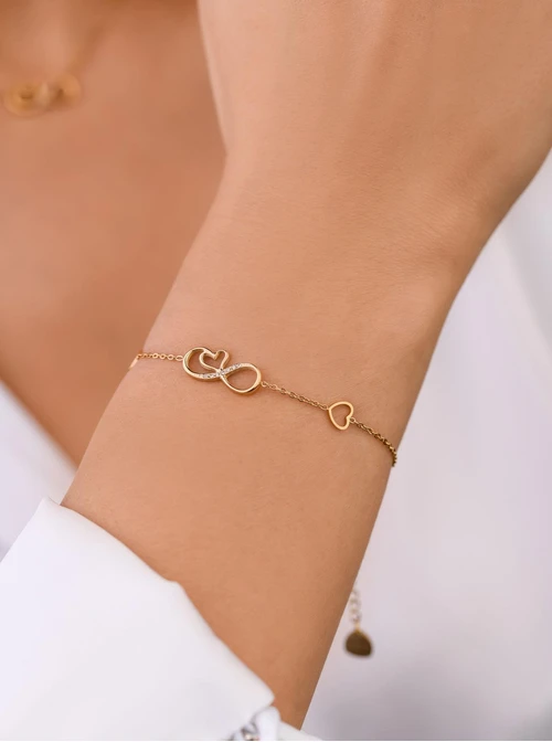 Bransoletka nieskończoność, serduszka, stal pozłacana S108317Z00