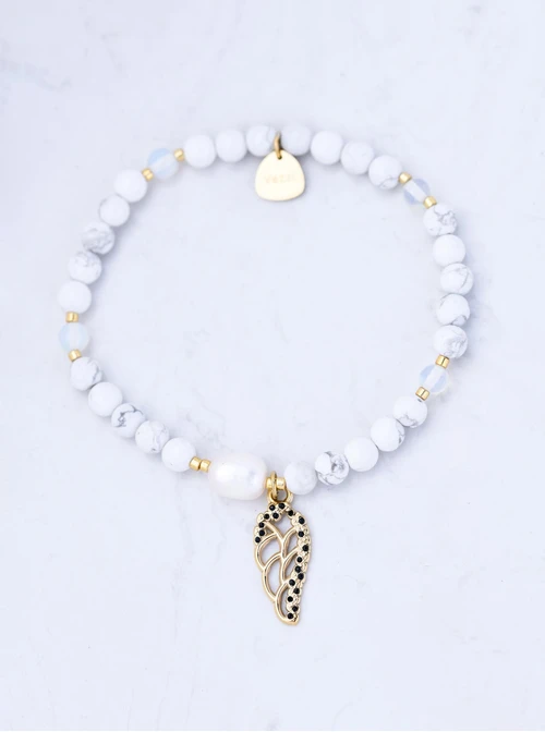 Bransoletka skrzydełko, perełka, Howlit, stal pozłacana S109399Z01