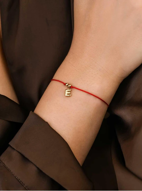 Bransoletka szczęścia, literka E, stal pozłacana S109073Z03