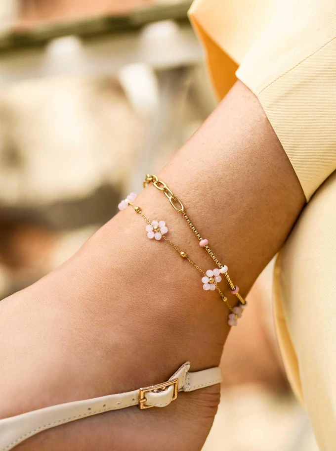 Bransoletka na kostkę, różowe kwiatuszki, stal pozłacana S109634Z06