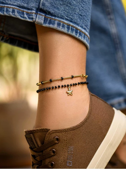 Bransoletka na kostkę, kuleczki, łańcuch, stal pozłacana S109617Z01