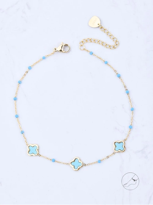 Bransoletka na kostkę, niebieskie koniczynki, stal pozłacana S109626Z04