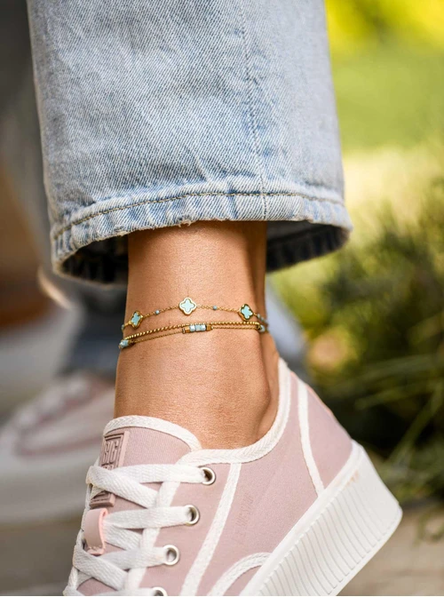 Bransoletka na kostkę, niebieskie koniczynki, stal pozłacana S109626Z04