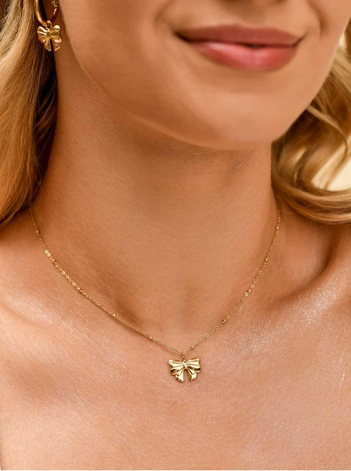 Naszyjnik kokardka, stal pozłacana S309899Z00