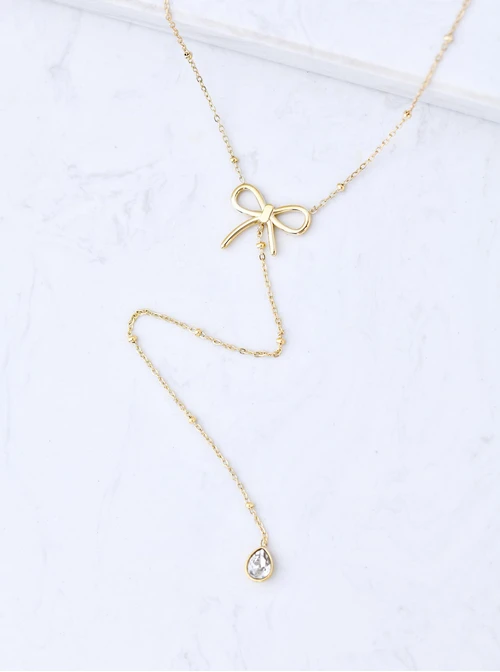 Naszyjnik krawatka, kokardka, stal pozłacana S309897Z00