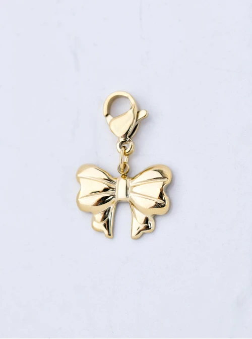 Zawieszka, charms kokardka, stal pozłacana SC09792Z00