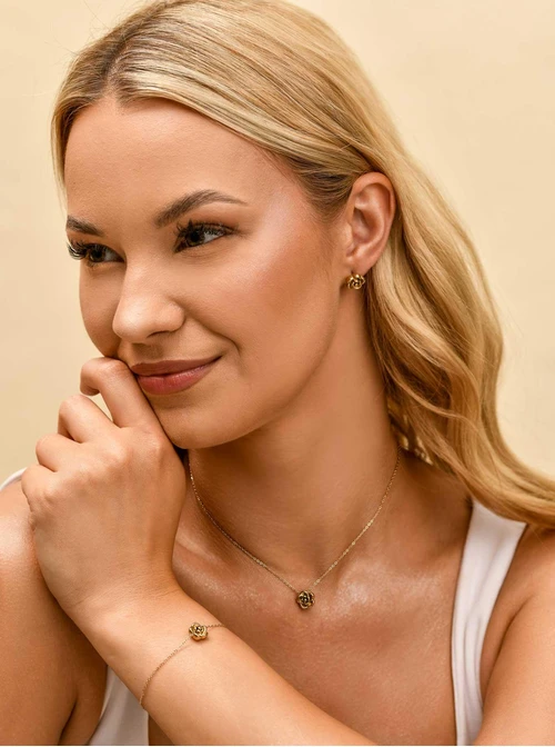 Bransoletka kwiatuszek, stal pozłacana S109975Z00