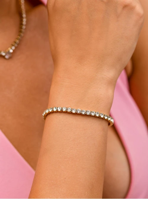 Bransoletka tenisowa z kryształkami, elastyczna, stal pozłacana S110265Z02