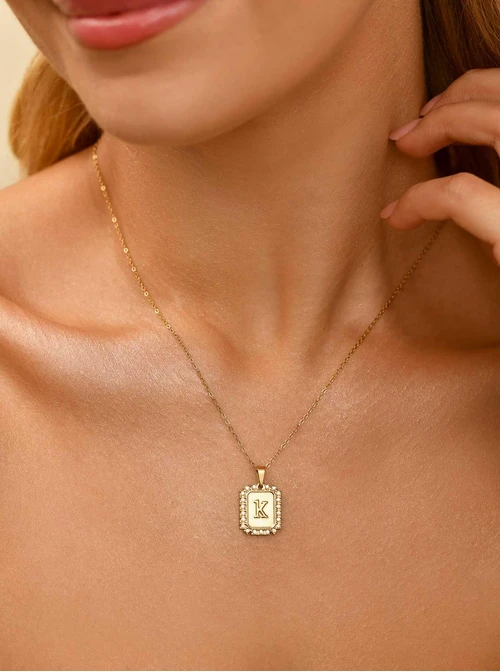 Naszyjnik literka K, kryształki, stal pozłacana S311328Z00