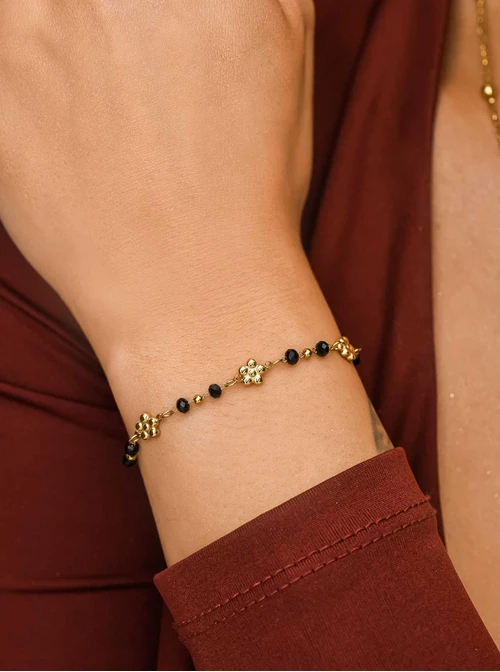 Bransoletka kwiatuszki, czarne kryształki, stal pozłacana S111804Z01