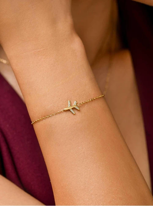 Bransoletka samolot z kryształkami, stal pozłacana S111720Z00