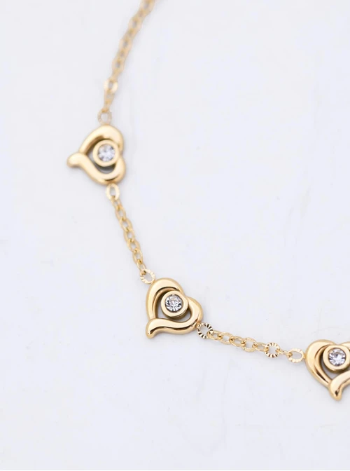 Bransoletka serduszka, kryształki, stal pozłacana S112505Z00