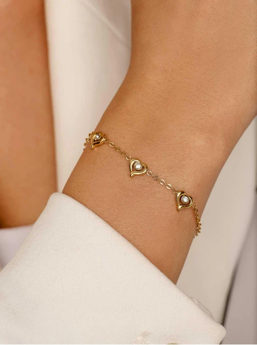 Bransoletka serduszka, kryształki, stal pozłacana S112505Z00