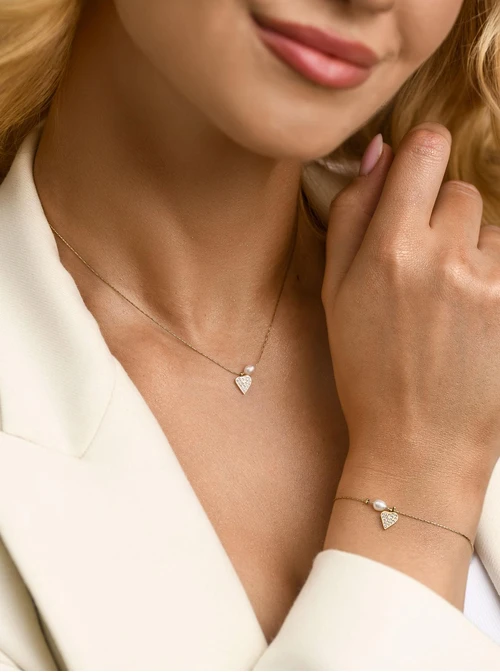 Bransoletka serduszko, kryształki, perełka, stal pozłacana S112361Z00