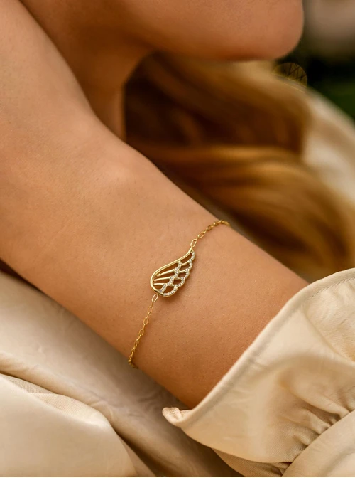 Bransoletka skrzydełko, kryształki, stal pozłacana S111679Z00