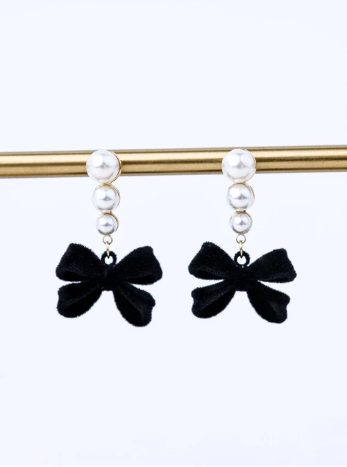 Kolczyki kokardki, perełki, stal pozłacana S211697Z01