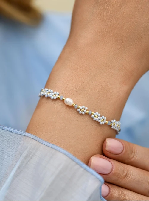 Bransoletka niebieskie kwiatuszki, stal pozłacana S112492Z04