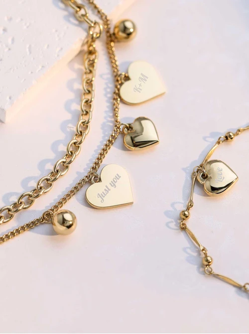 Bransoletka podwójna, serca, kulki, stal pozłacana S112281Z00