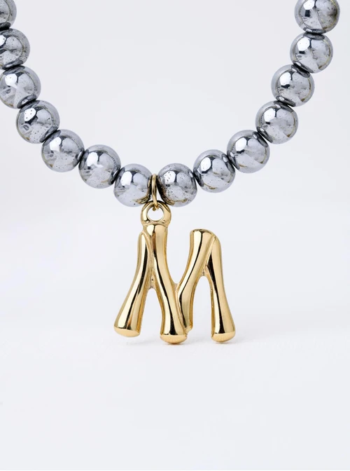 Naszyjnik literka M, Hematyt, stal pozłacana S312608S00