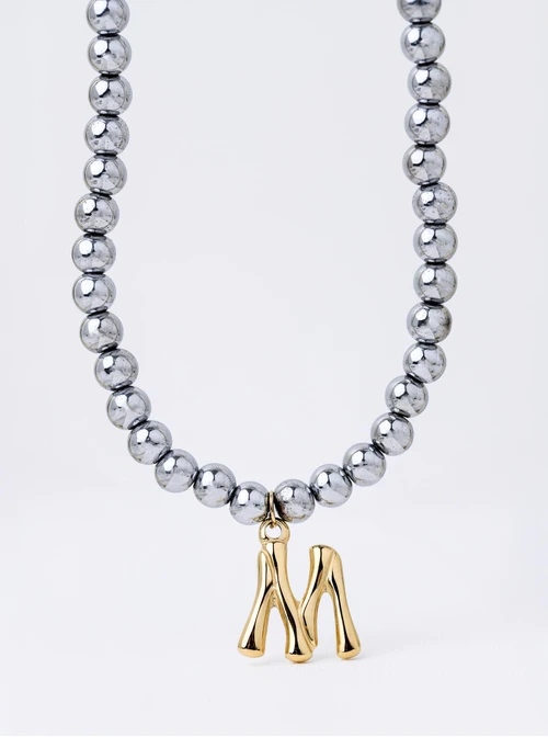 Naszyjnik literka M, Hematyt, stal pozłacana S312608S00