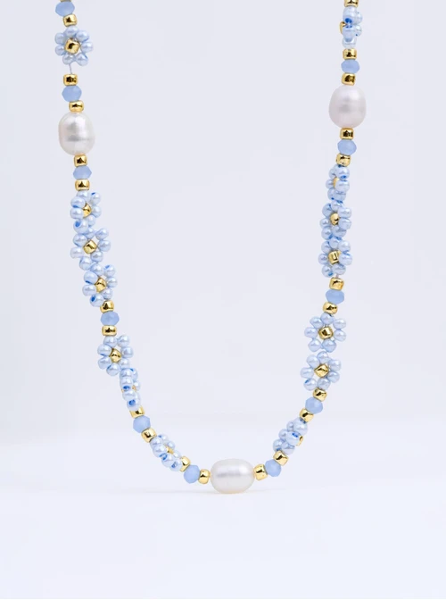 Naszyjnik niebieskie kwiatuszki, perełki, stal pozłacana S312493Z04