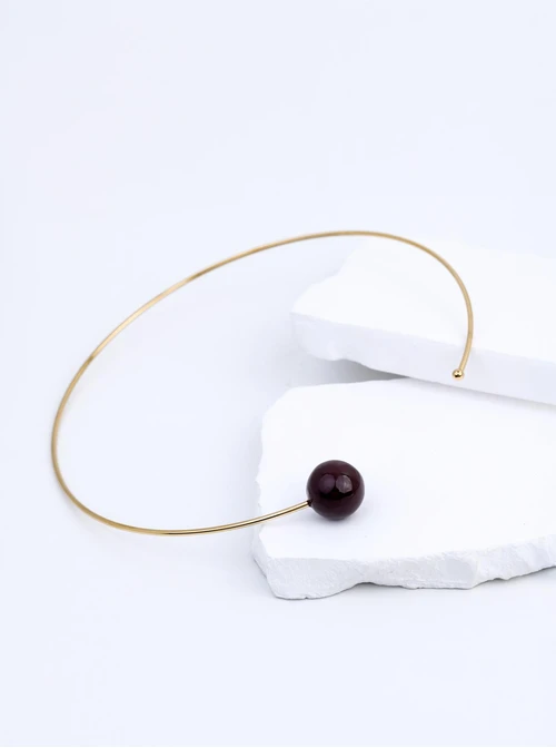 Naszyjnik sztywny, otwarty, brązowa kulka, stal pozłacana S312543Z13