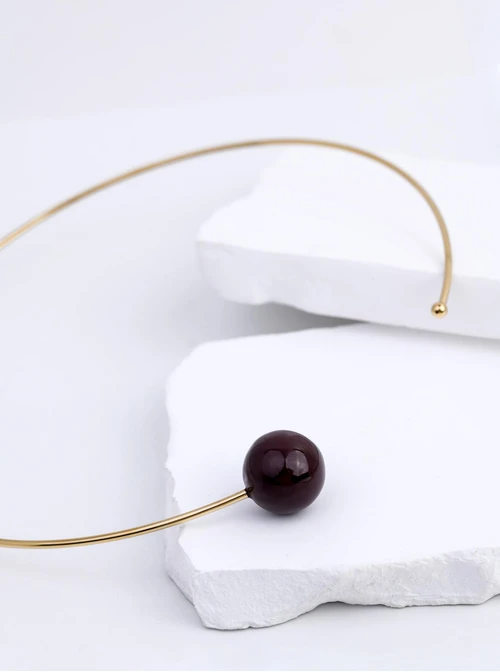 Naszyjnik sztywny, otwarty, brązowa kulka, stal pozłacana S312543Z13