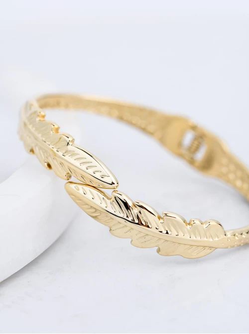 Bransoletka sztywna, liście, stal pozłacana S112647Z00