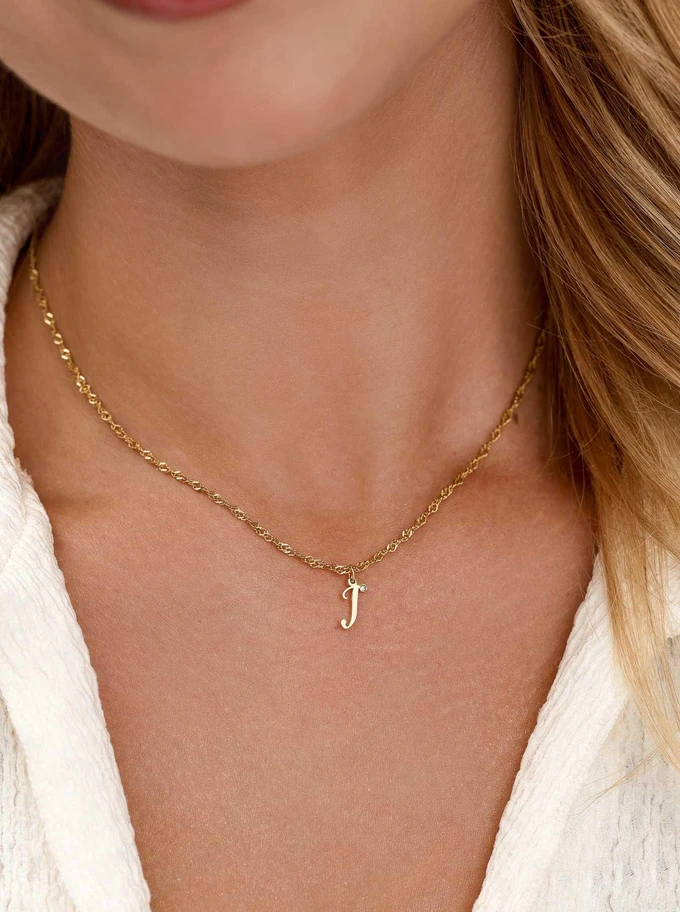 Naszyjnik literka J, kryształek, stal pozłacana S315638Z00