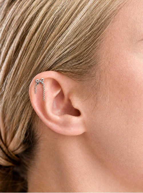 Kolczyk do piercingu labret, kokardka, stal ST15871S00