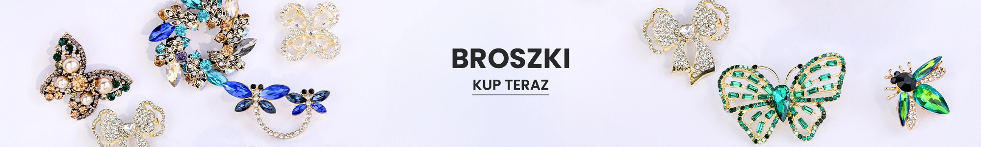 Zdobione broszki w kształcie motyli, kokardek i owadów z kolorowymi kryształkami na jasnym tle, obok napis 'Broszki – kup teraz