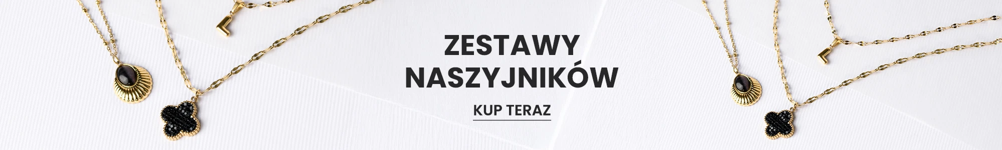 Zestaw złotych naszyjników z czarnymi oczkami - kolekcja biżuterii modowej.