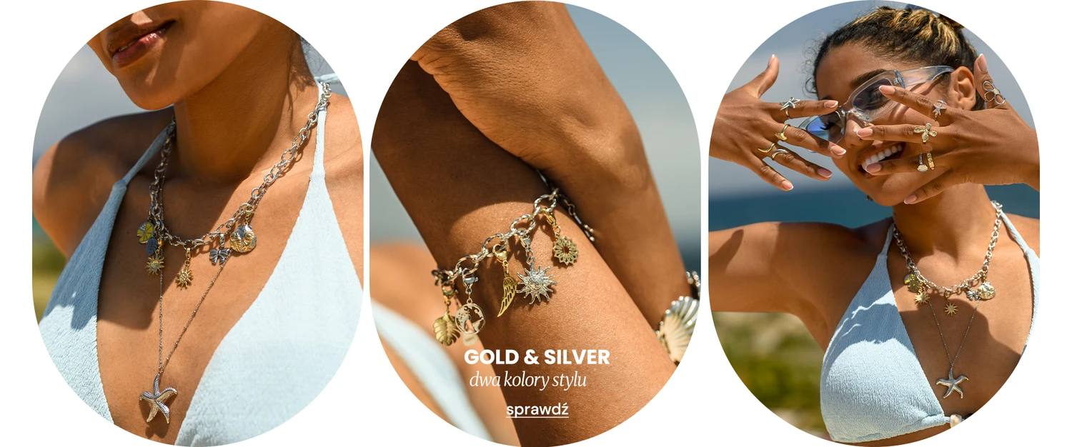 Biżuteria z kolekcji Gold & Silver – naszyjnik i bransoletka z charmsami oraz pierścionki, prezentowane przez modelką o ciemnej karnacji w jasno-niebieskiej stylizacji 